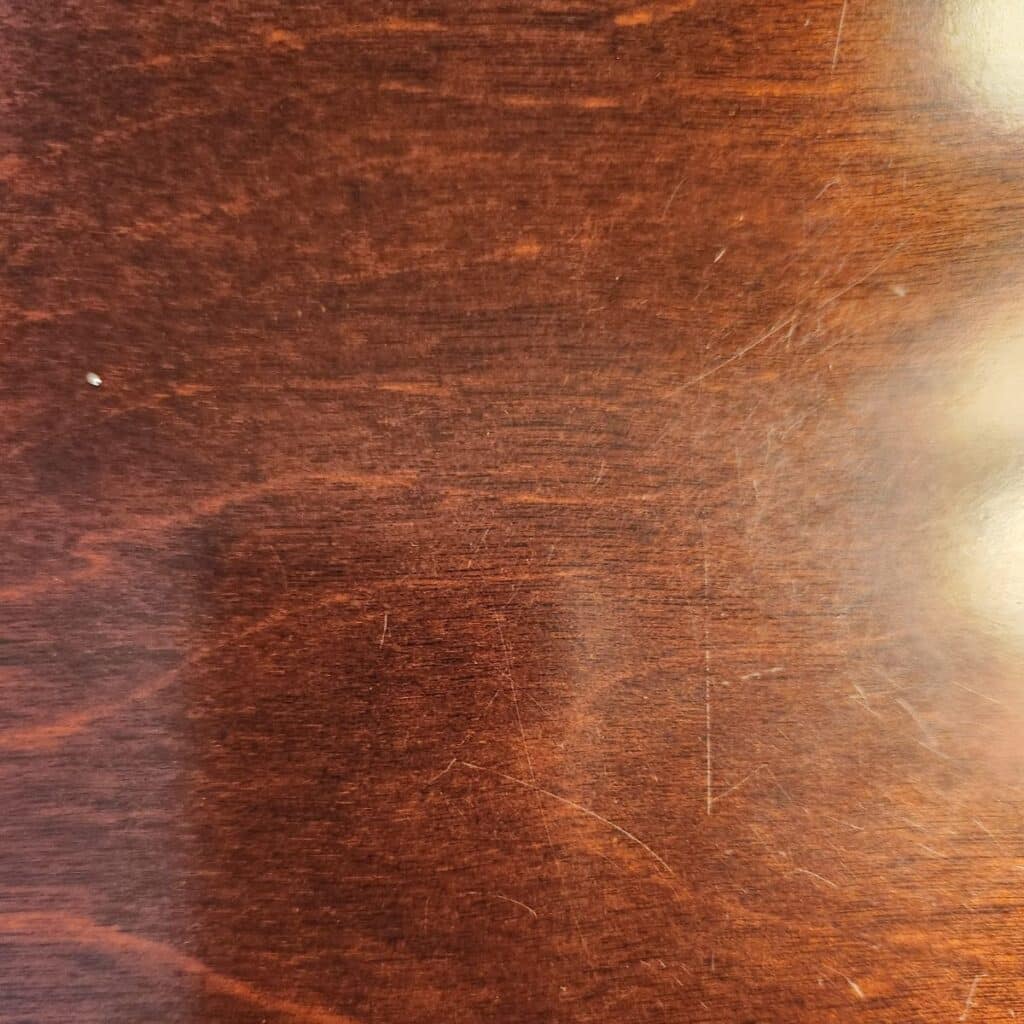 the wooden table after removing the heat stain.