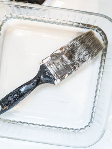 soaking brushes in vinegar to remove hardened paint