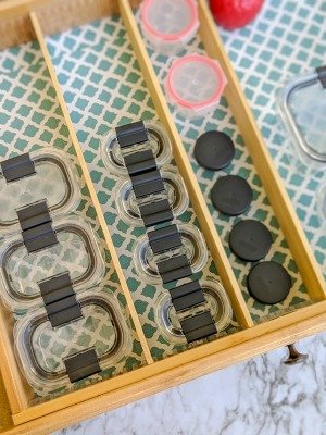 tupperware drawer organized using a diy drawer organizer