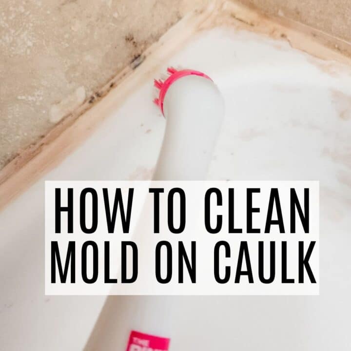 scrubbing at mold on caulk with a powerbrush