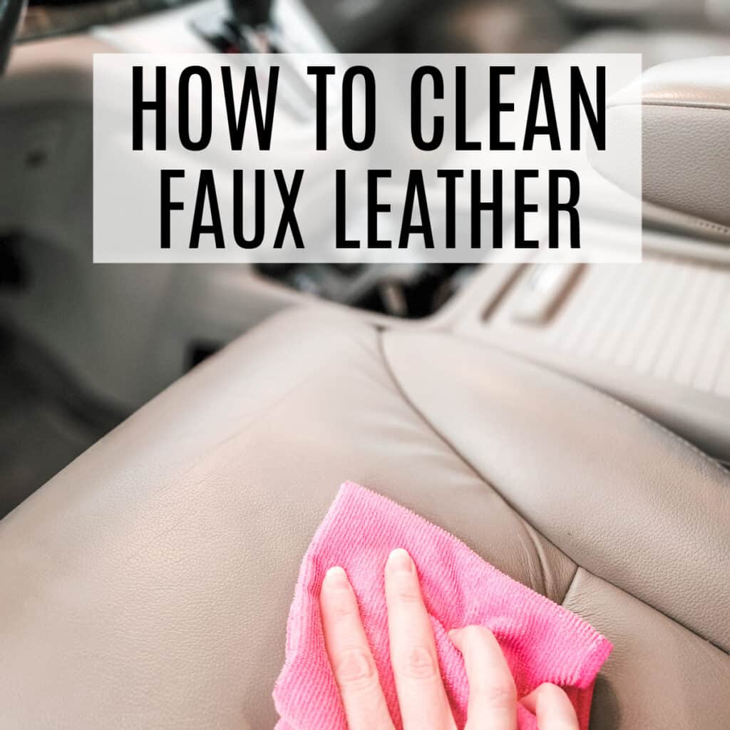 Wiping faux leather seats with a cloth.