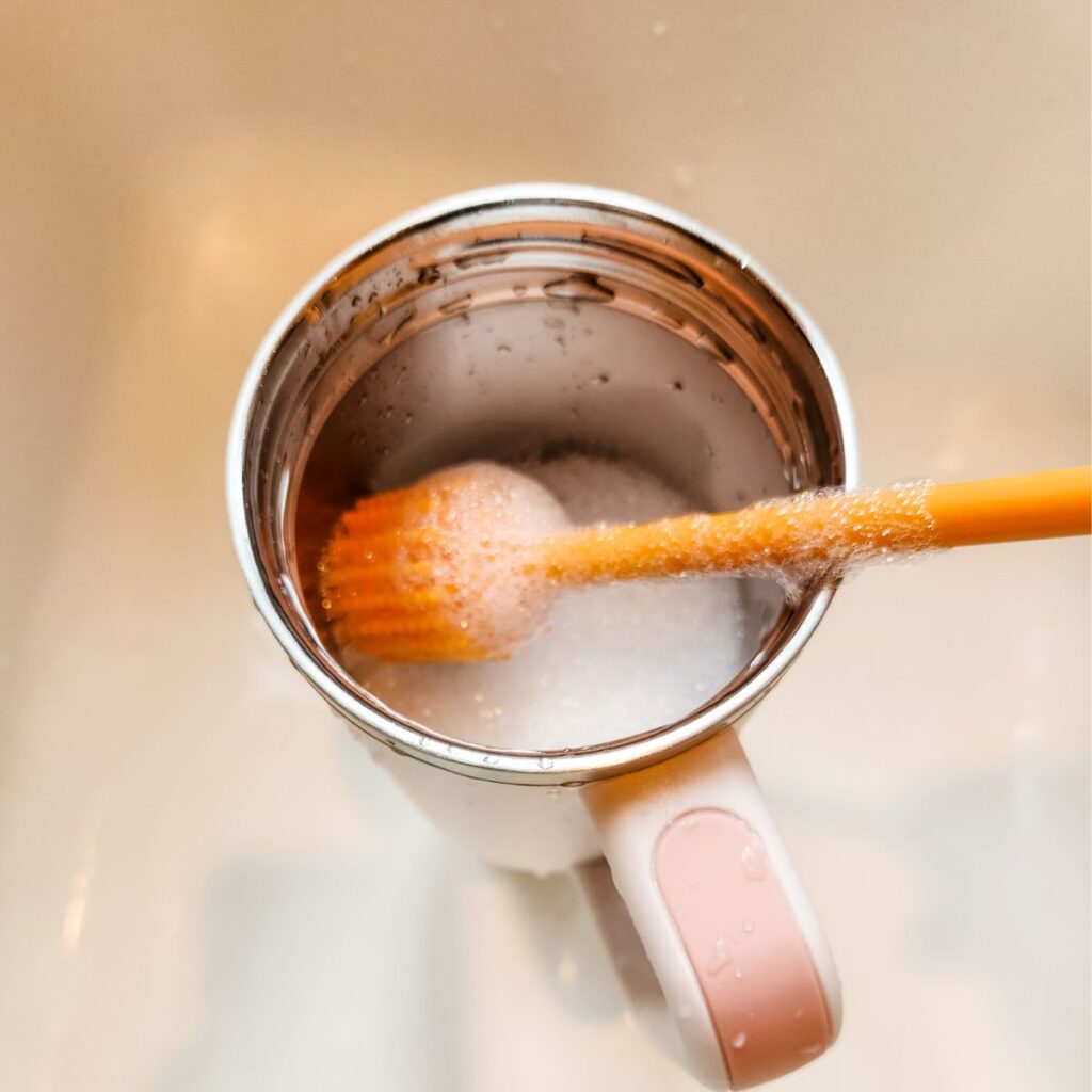 using bottle brush to clean stanley tumbler