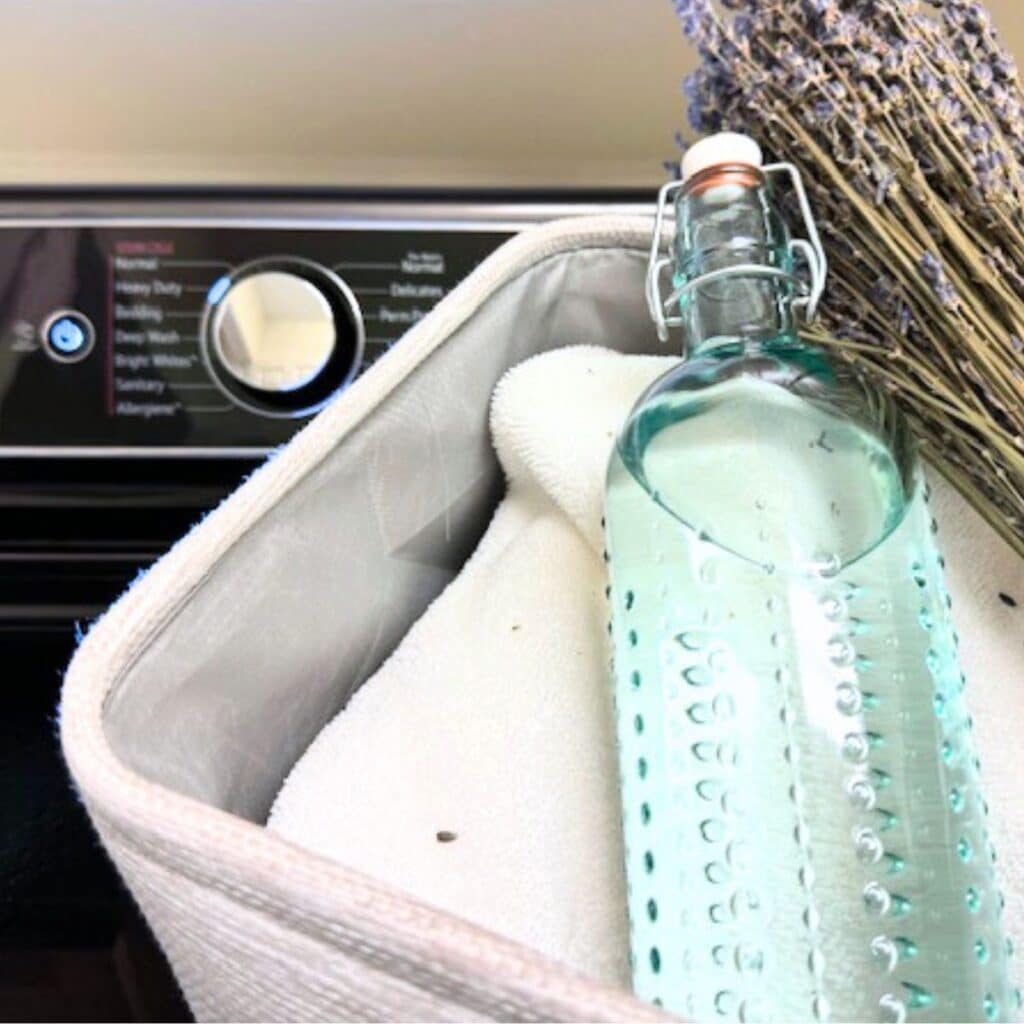 diy fabric softener sitting on washing machine