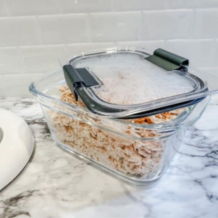 shredded chicken breasts in a freezer safe container